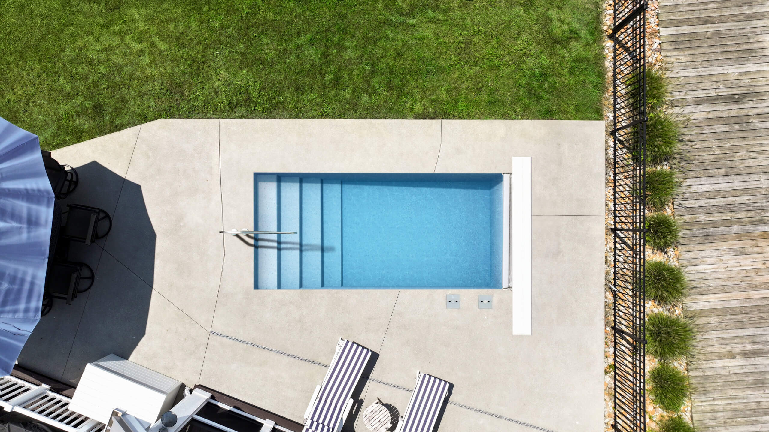 Installed The Nest plunge pool with full-width entry stairs, seen from above