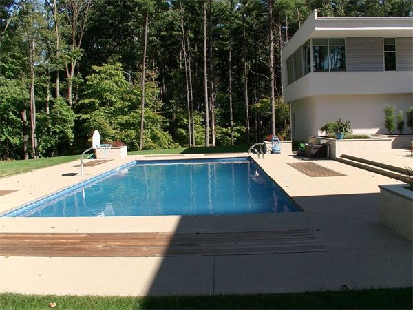 Vinyl liner inground pool with diving board, seen from above