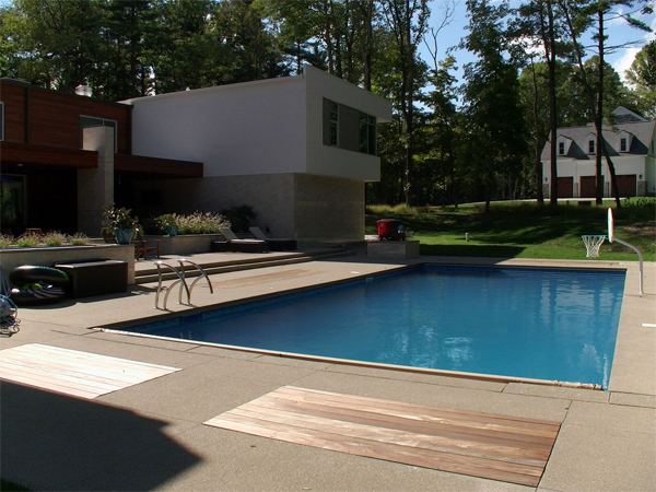 Vinyl liner inground pool with diving board, seen from above
