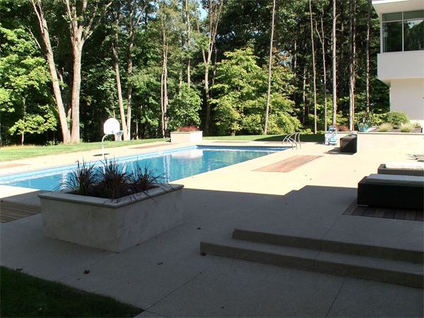 Vinyl liner inground pool with diving board, seen from above