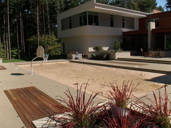 Vinyl liner inground pool with diving board, seen from above