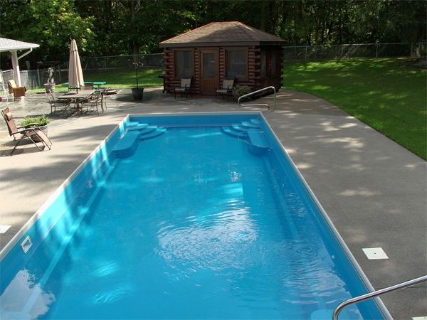 Inground fiberglass swimming pool in a Central Ohio backyard by The Pool People of Ohio