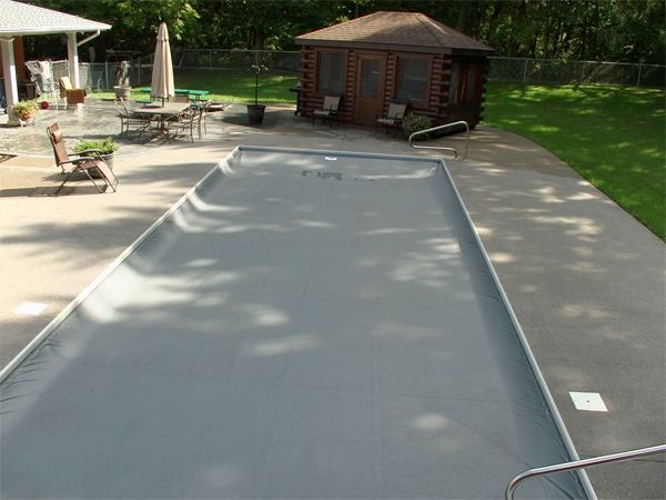 Inground fiberglass swimming pool in a Central Ohio backyard by The Pool People of Ohio