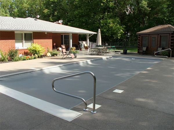 Inground fiberglass swimming pool in a Central Ohio backyard by The Pool People of Ohio