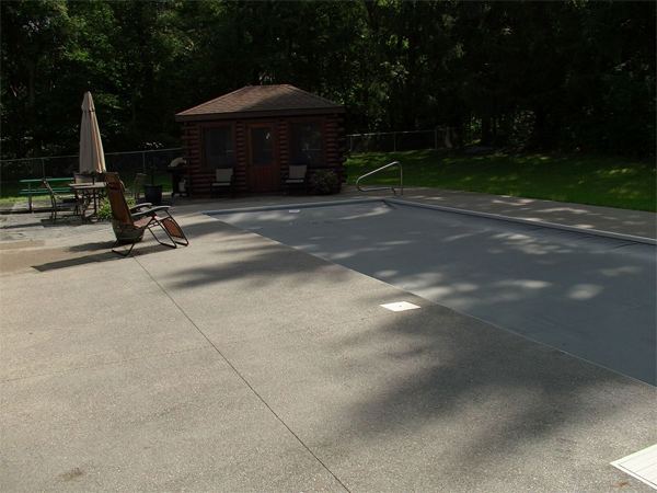 Inground fiberglass swimming pool in a Central Ohio backyard by The Pool People of Ohio