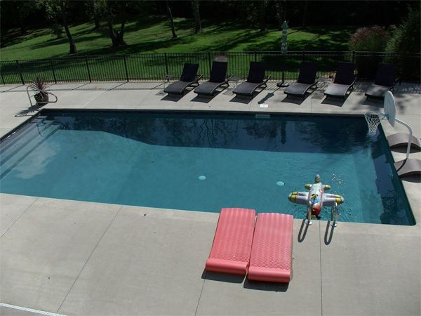 Inground fiberglass swimming pool in a Central Ohio backyard by The Pool People of Ohio