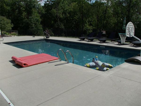 Inground fiberglass swimming pool in a Central Ohio backyard by The Pool People of Ohio