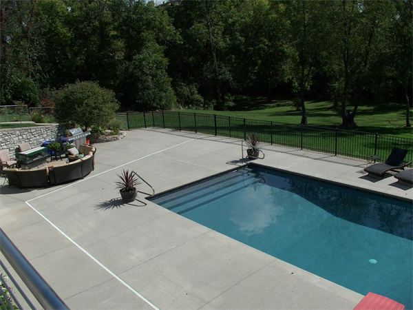 Inground fiberglass swimming pool in a Central Ohio backyard by The Pool People of Ohio