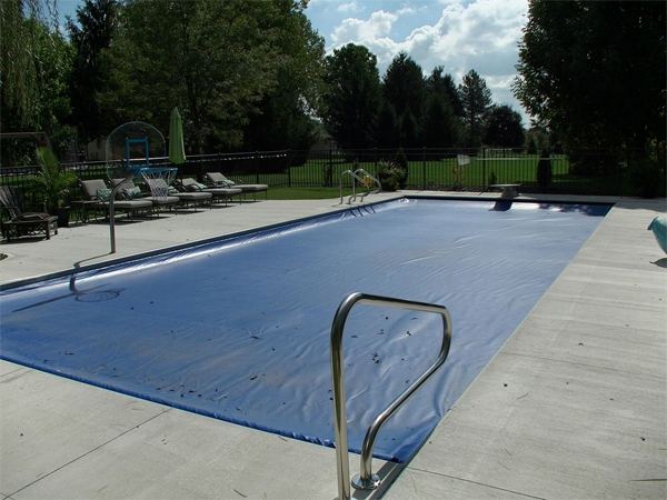 Inground fiberglass swimming pool in a Central Ohio backyard by The Pool People of Ohio
