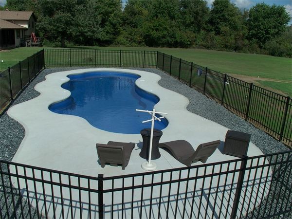 Inground fiberglass swimming pool in a Central Ohio backyard by The Pool People of Ohio