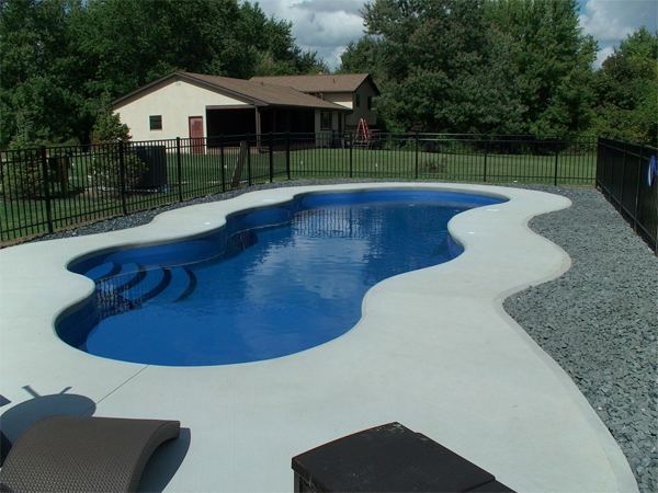 Inground fiberglass swimming pool in a Central Ohio backyard by The Pool People of Ohio