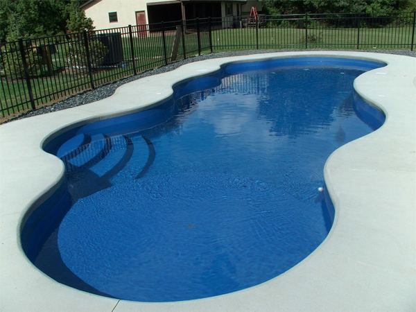 Inground fiberglass swimming pool in a Central Ohio backyard by The Pool People of Ohio