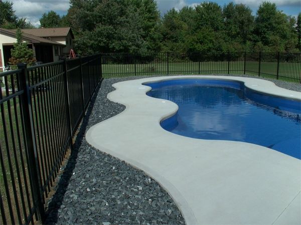 Inground fiberglass swimming pool in a Central Ohio backyard by The Pool People of Ohio