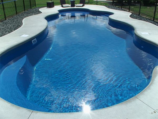 Inground fiberglass swimming pool in a Central Ohio backyard by The Pool People of Ohio