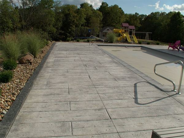 Inground fiberglass swimming pool in a Central Ohio backyard by The Pool People of Ohio