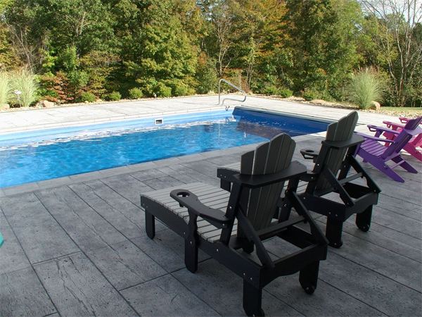Inground fiberglass swimming pool in a Central Ohio backyard by The Pool People of Ohio