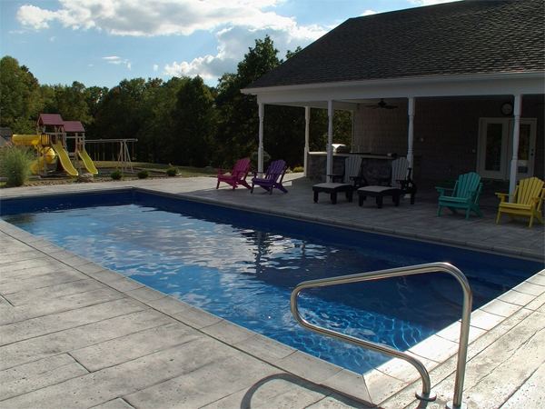 Inground fiberglass swimming pool in a Central Ohio backyard by The Pool People of Ohio
