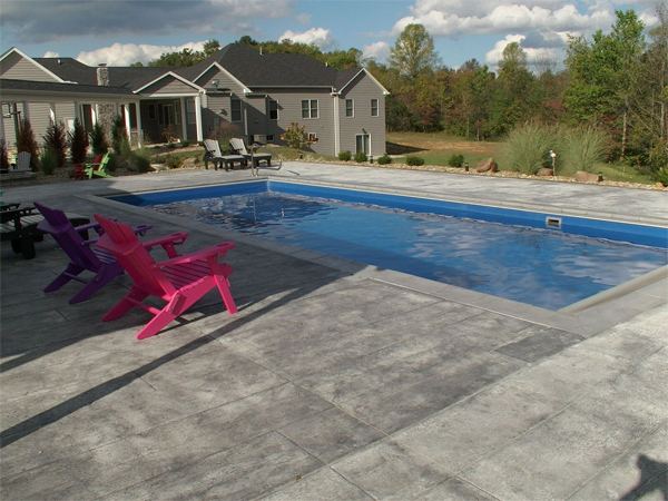 Inground fiberglass swimming pool in a Central Ohio backyard by The Pool People of Ohio