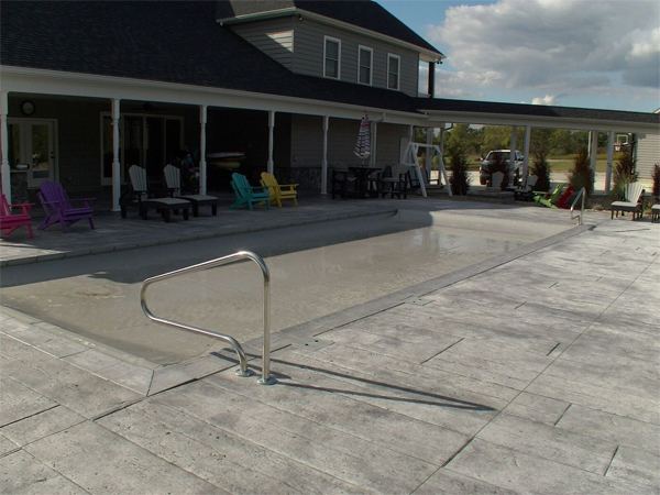 Inground fiberglass swimming pool in a Central Ohio backyard by The Pool People of Ohio