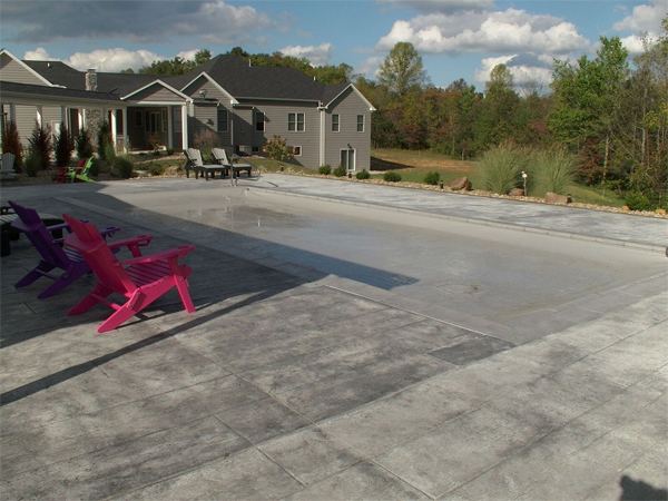 Inground fiberglass swimming pool in a Central Ohio backyard by The Pool People of Ohio