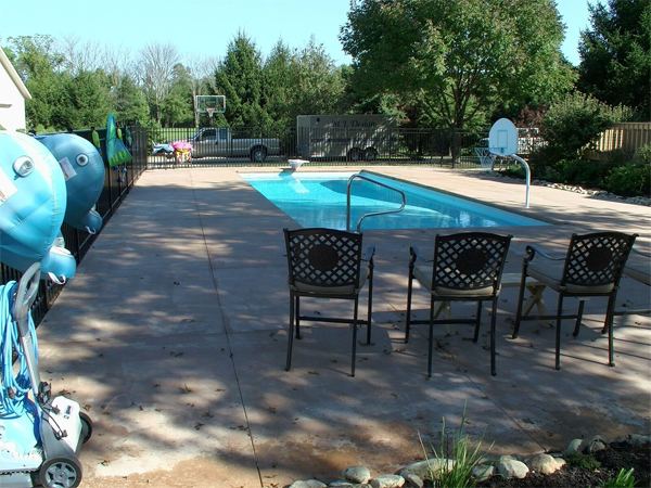 Inground fiberglass swimming pool in a Central Ohio backyard by The Pool People of Ohio