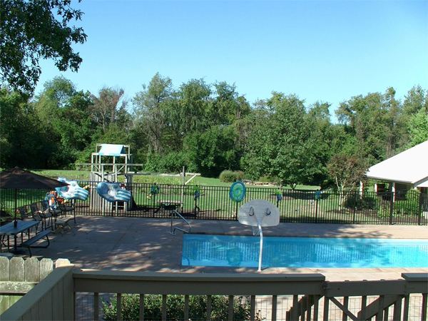 Inground fiberglass swimming pool in a Central Ohio backyard by The Pool People of Ohio