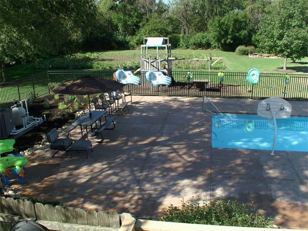Inground fiberglass swimming pool in a Central Ohio backyard by The Pool People of Ohio