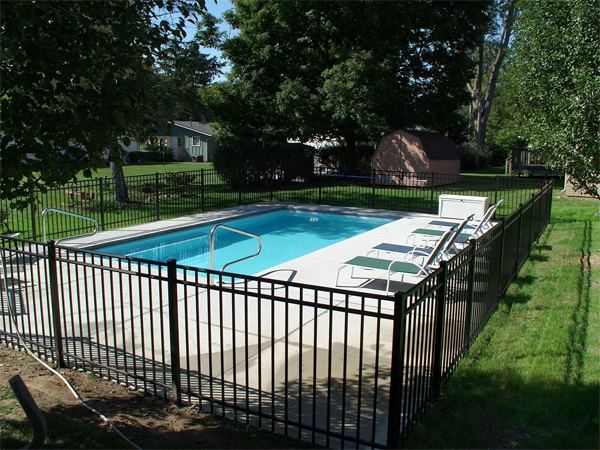 Inground fiberglass swimming pool in a Central Ohio backyard by The Pool People of Ohio