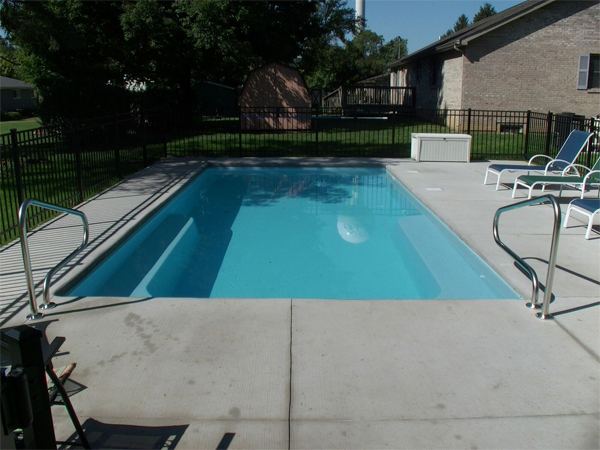 Inground fiberglass swimming pool in a Central Ohio backyard by The Pool People of Ohio