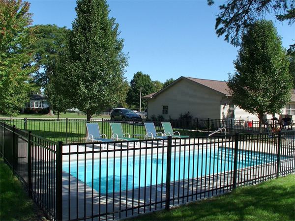 Inground fiberglass swimming pool in a Central Ohio backyard by The Pool People of Ohio