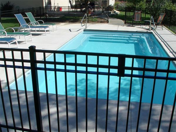 Inground fiberglass swimming pool in a Central Ohio backyard by The Pool People of Ohio
