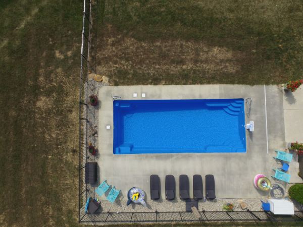 Inground fiberglass swimming pool installed by The Pool People of Ohio