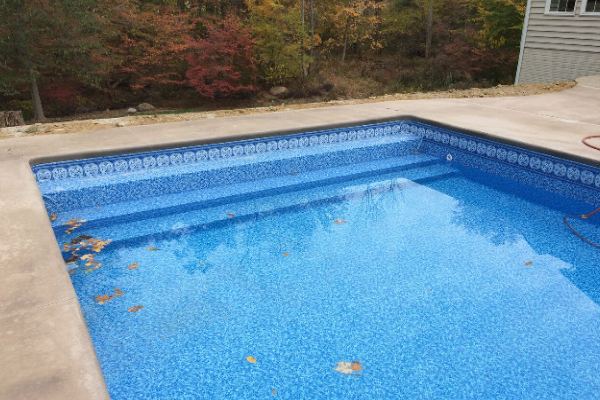 Inground fiberglass swimming pool in a Central Ohio backyard by The Pool People of Ohio