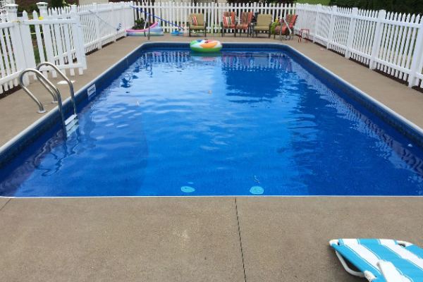 Inground fiberglass swimming pool in a Central Ohio backyard by The Pool People of Ohio
