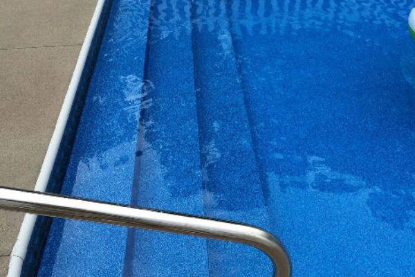 Inground fiberglass swimming pool in a Central Ohio backyard by The Pool People of Ohio