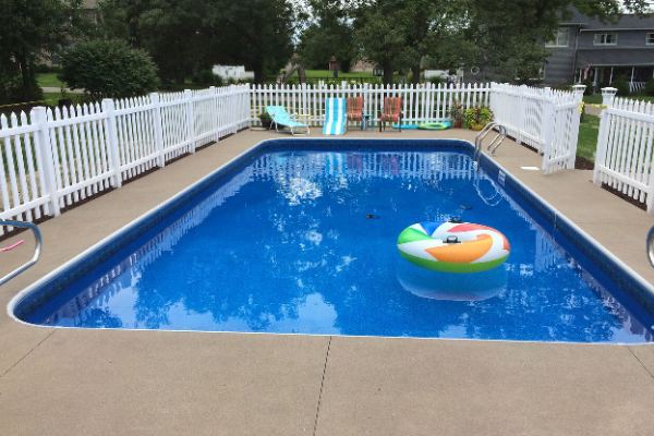 Inground fiberglass swimming pool in a Central Ohio backyard by The Pool People of Ohio