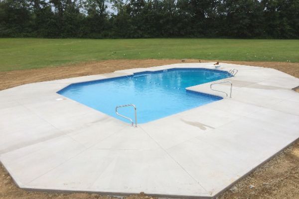 Inground fiberglass swimming pool in a Central Ohio backyard by The Pool People of Ohio