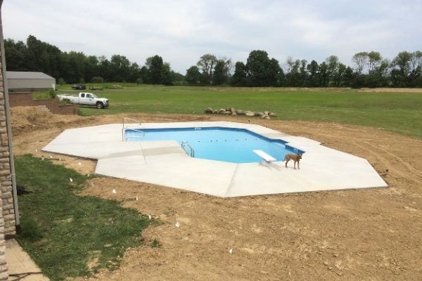 Inground fiberglass swimming pool in a Central Ohio backyard by The Pool People of Ohio