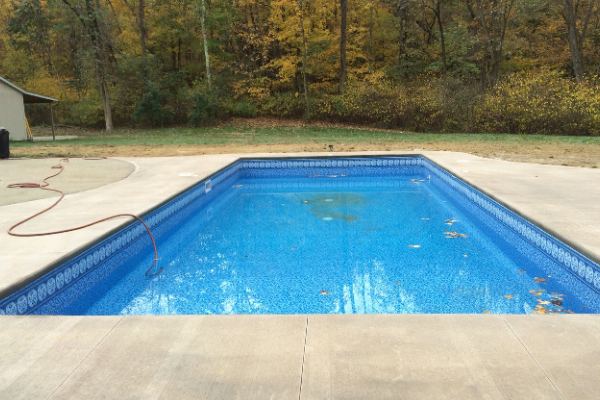 Inground fiberglass swimming pool in a Central Ohio backyard by The Pool People of Ohio
