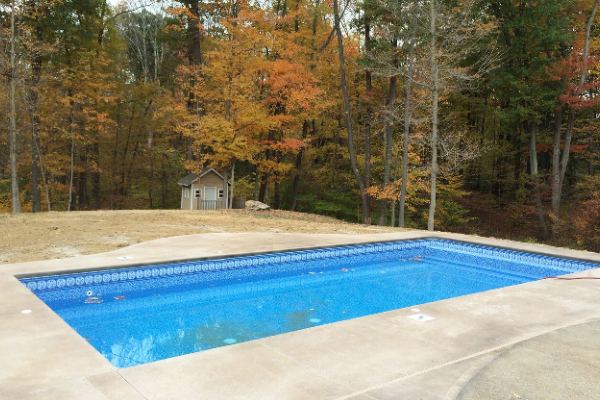 Inground fiberglass swimming pool in a Central Ohio backyard by The Pool People of Ohio