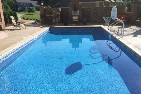 Inground fiberglass swimming pool in a Central Ohio backyard by The Pool People of Ohio