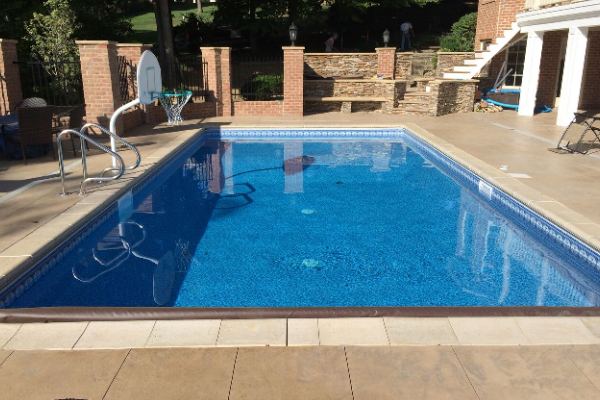 Inground fiberglass swimming pool in a Central Ohio backyard by The Pool People of Ohio