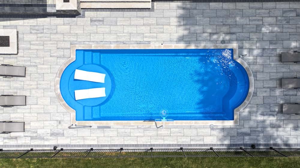 Inground fiberglass swimming pool installed by The Pool People of Ohio