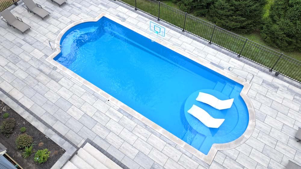 Inground fiberglass swimming pool installed by The Pool People of Ohio