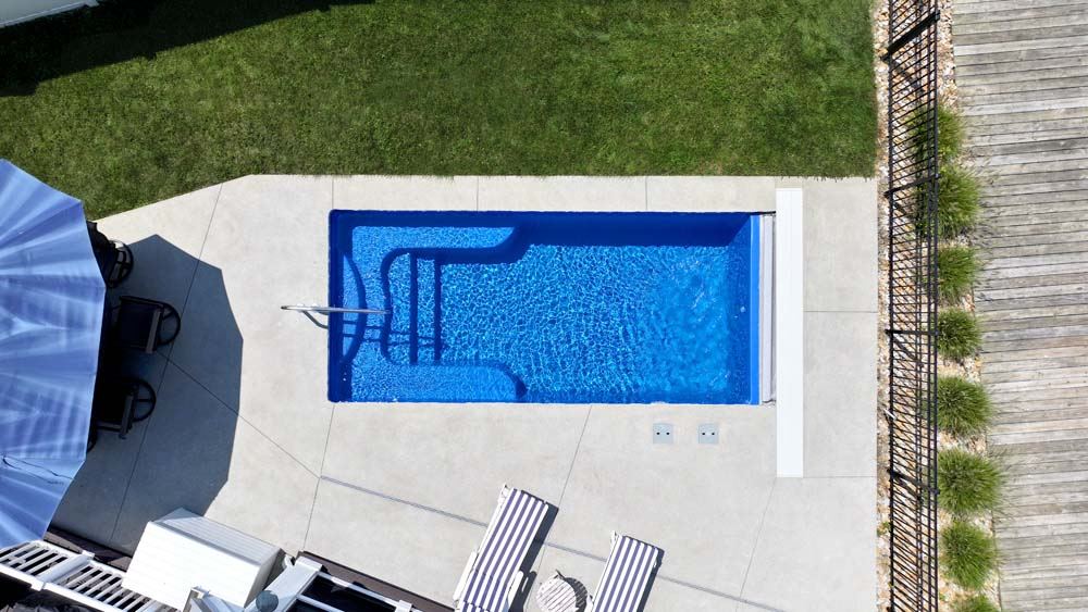 Inground fiberglass swimming pool installed by The Pool People of Ohio