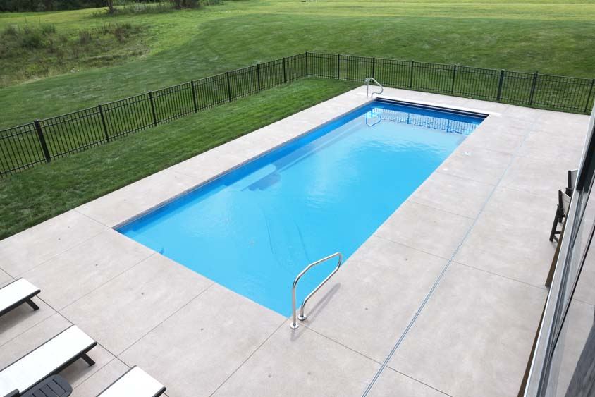 Inground fiberglass swimming pool installed by The Pool People of Ohio